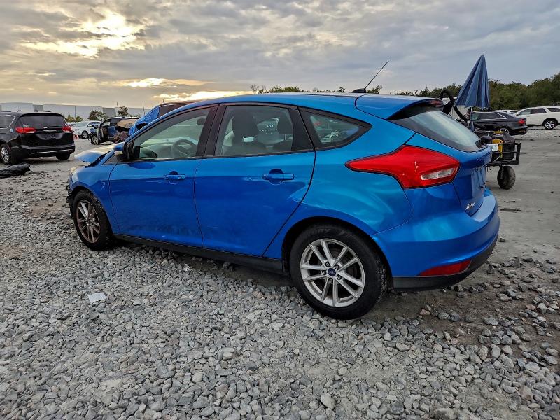 Photo 2 from auction – 2015 FORD FOCUS SE with VIN 1FADP3K21FL252950