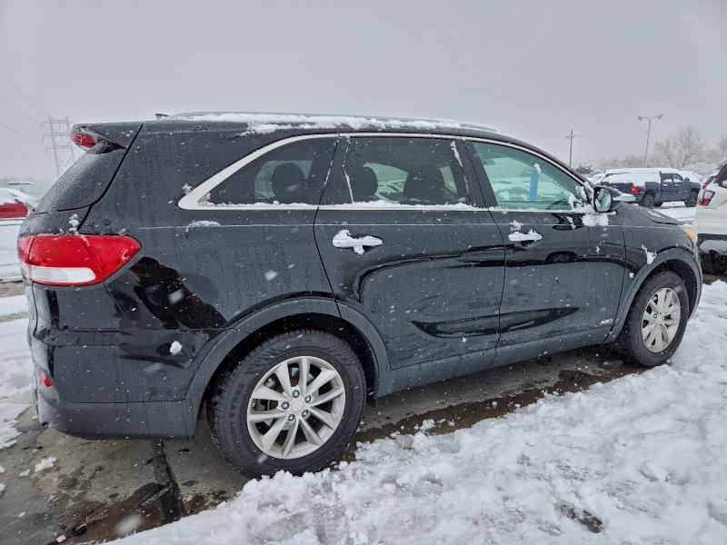 Photo 3 from auction – 2016 KIA SORENTO LX with VIN 5XYPGDA33GG065374