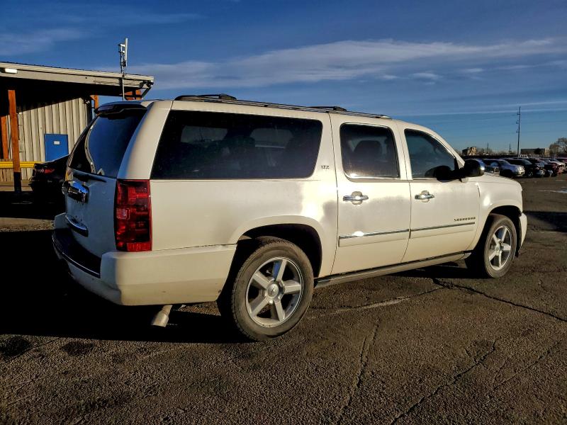 Photo 3 from auction – 2014 CHEVROLET SUBURBAN with VIN 1GNSKKE7XER129331