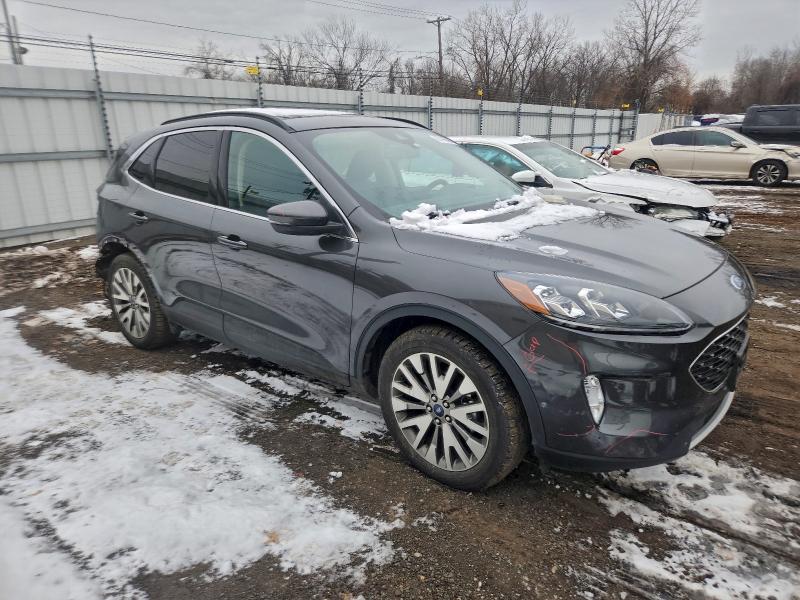 Photo 4 from auction – 2020 FORD ESCAPE TIT with VIN 1FMCU9DZ9LUC19496
