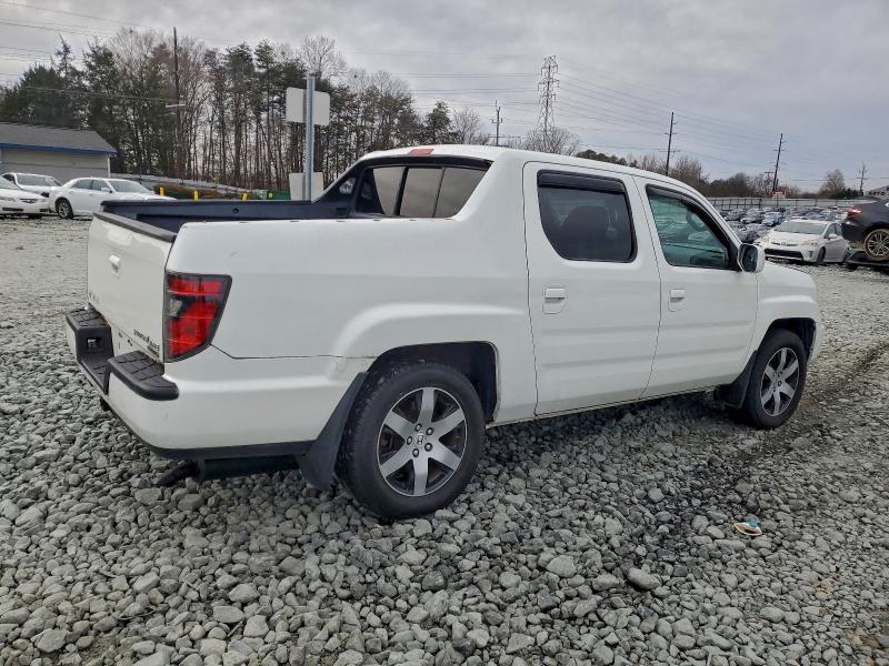Photo 3 from auction – 2014 HONDA RIDGELINE with VIN 5FPYK1F61EB009899
