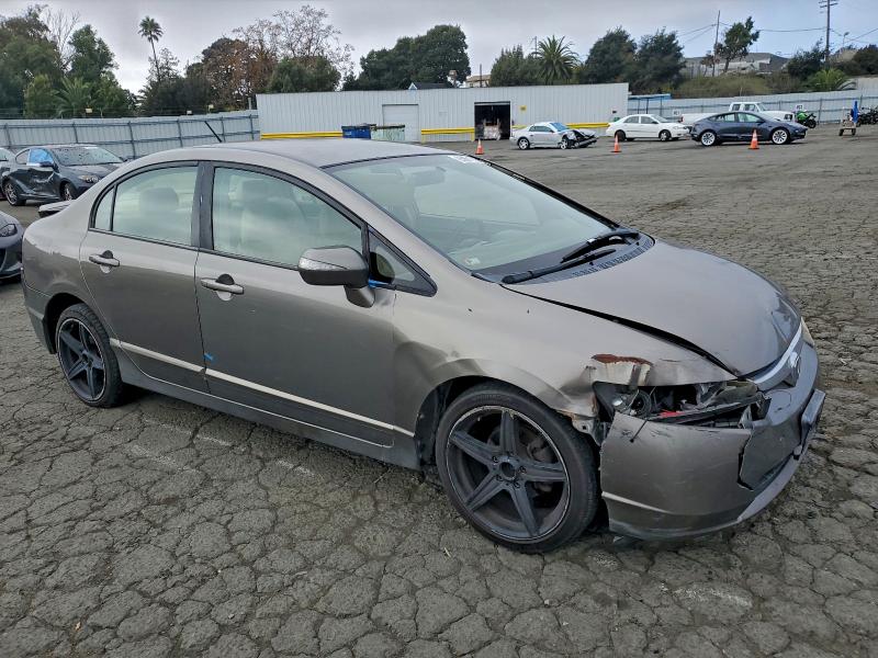 Photo 4 from auction – 2007 HONDA CIVIC HYBR with VIN JHMFA36297S005387