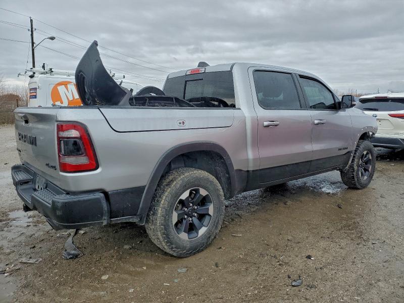 Photo 3 from auction – 2021 RAM 1500 with VIN 1C6SRFLM4MN811400