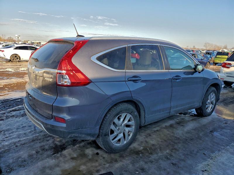 Photo 3 from auction – 2015 HONDA CR-V EXL with VIN 5J6RM4H72FL134692