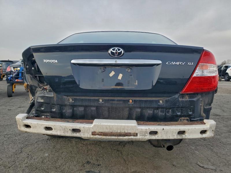 Photo 6 from auction – 2003 TOYOTA CAMRY LE with VIN 4T1BE30K33U171072