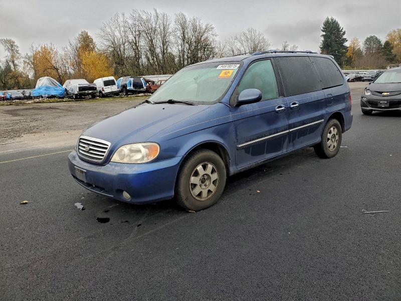 KIA SEDONA EX 2002 with VIN KNDUP131526234884 - Photo from auction