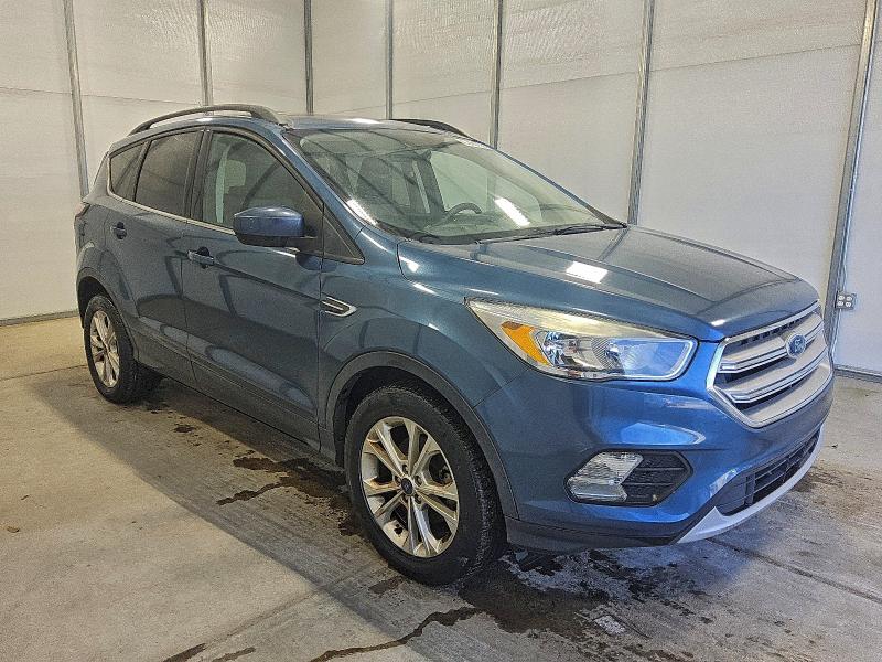 Photo 4 from auction – 2018 FORD ESCAPE SE with VIN 1FMCU0GDXJUC40737