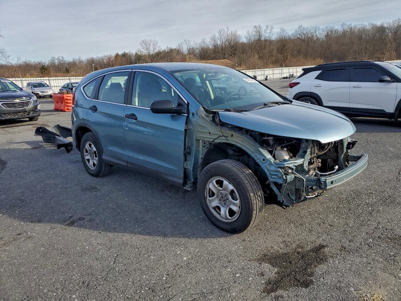 Photo 4 from auction – 2014 HONDA CR-V LX with VIN 2HKRM4H33EH681685
