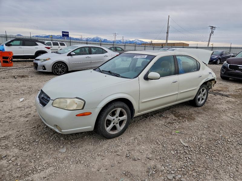 NISSAN MAXIMA GLE 2000 with VIN JN1CA31D0YT544332 - Photo from auction