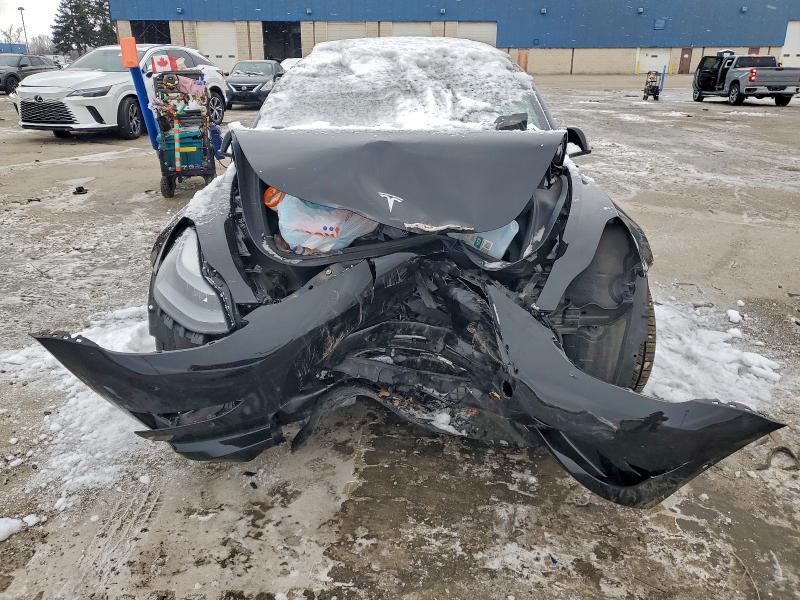 Photo 5 from auction – 2021 TESLA MODEL 3 with VIN 5YJ3E1EA0MF075309