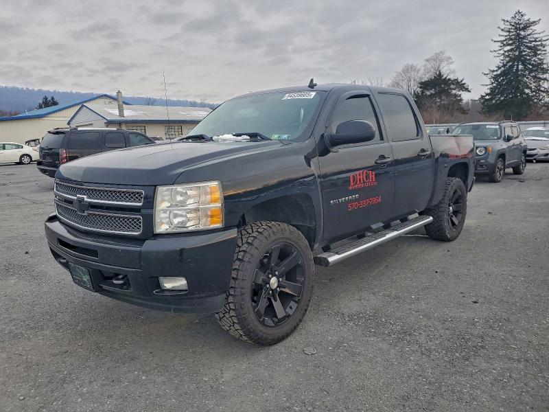 CHEVROLET SILVERADO 2013 with VIN 3GCPKSE7XDG186772 - Photo from auction