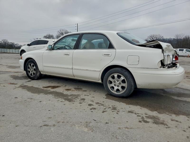 Photo 2 from auction – 1999 MAZDA 626 ES with VIN 1YVGF22C6X5822258