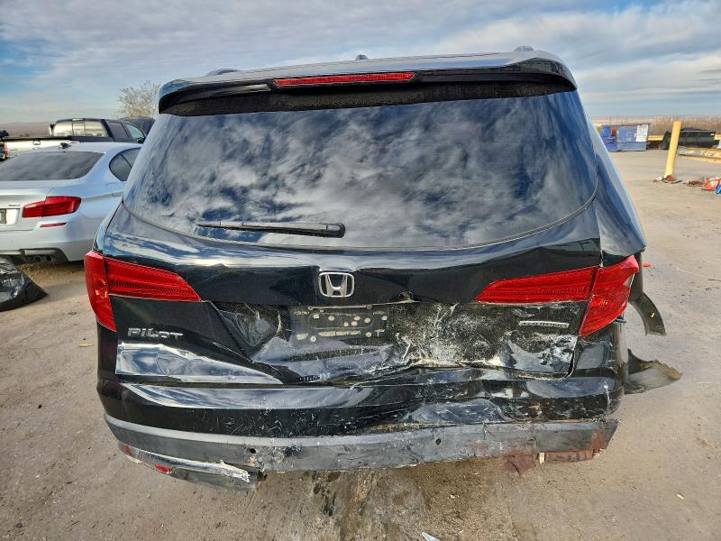 Photo 6 from auction – 2016 HONDA PILOT with VIN 5FNYF5H92GB012762