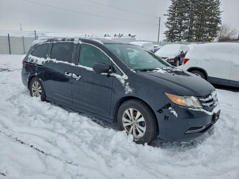 Photo 4 from auction – 2014 HONDA ODYSSEY EX with VIN 5FNRL5H44EB097571
