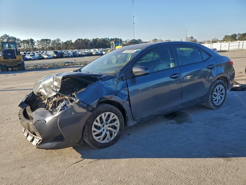 TOYOTA COROLLA L 2019 with VIN 5YFBURHE7KP929175 - Photo from auction