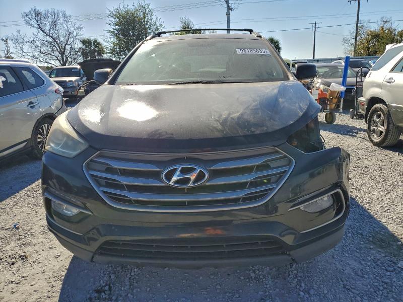 Photo 5 from auction – 2017 HYUNDAI SANTA FE S with VIN 5NMZU3LB3HH037260