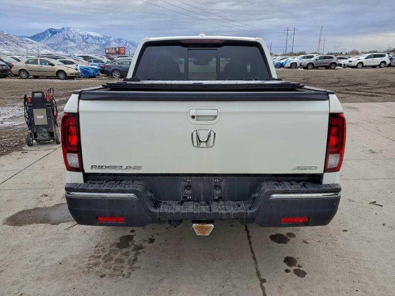 Photo 6 from auction – 2017 HONDA RIDGELINE with VIN 5FPYK3F76HB032555