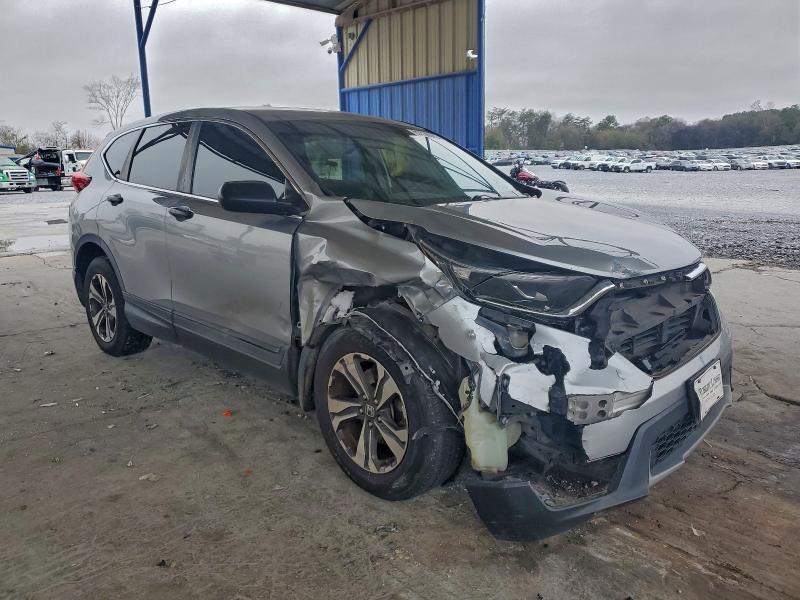 Photo 4 from auction – 2017 HONDA CR-V LX with VIN 7FARW5H31HE014203