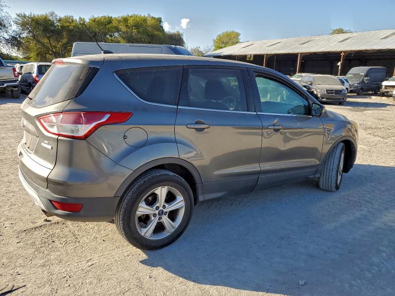 Photo 3 from auction – 2014 FORD ESCAPE SE with VIN 1FMCU0GX4EUE11689