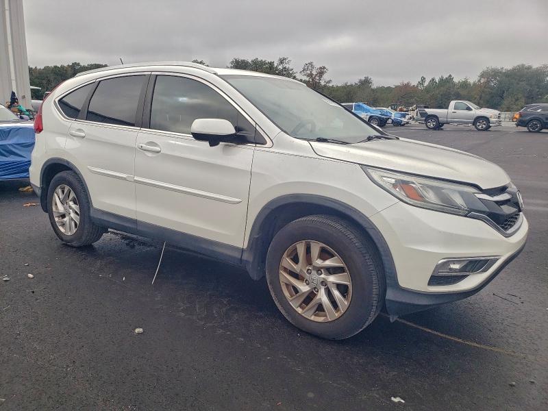 Photo 4 from auction – 2015 HONDA CR-V EXL with VIN 5J6RM3H71FL003652