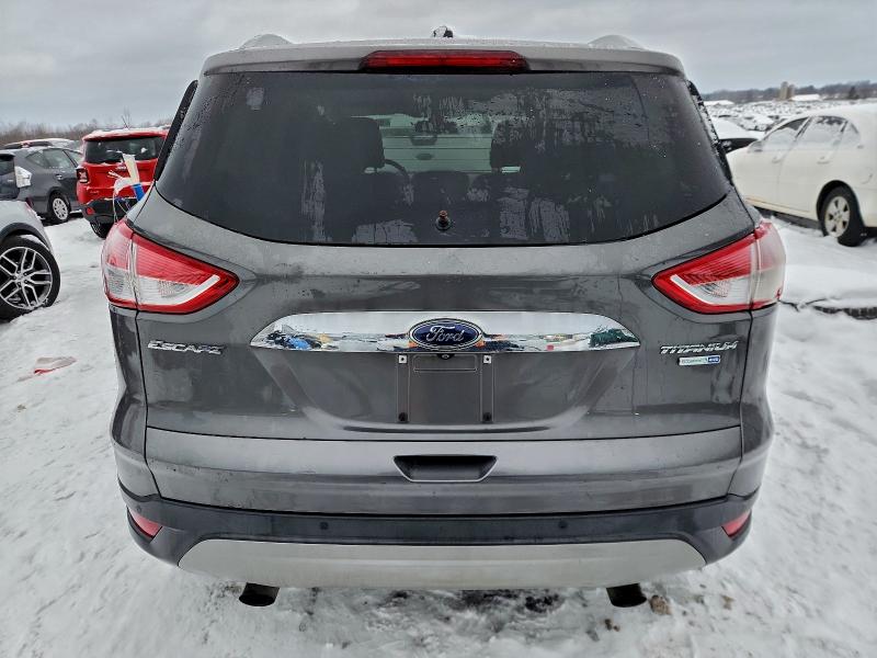 Photo 6 from auction – 2014 FORD ESCAPE TIT with VIN 1FMCU9J99EUA09858