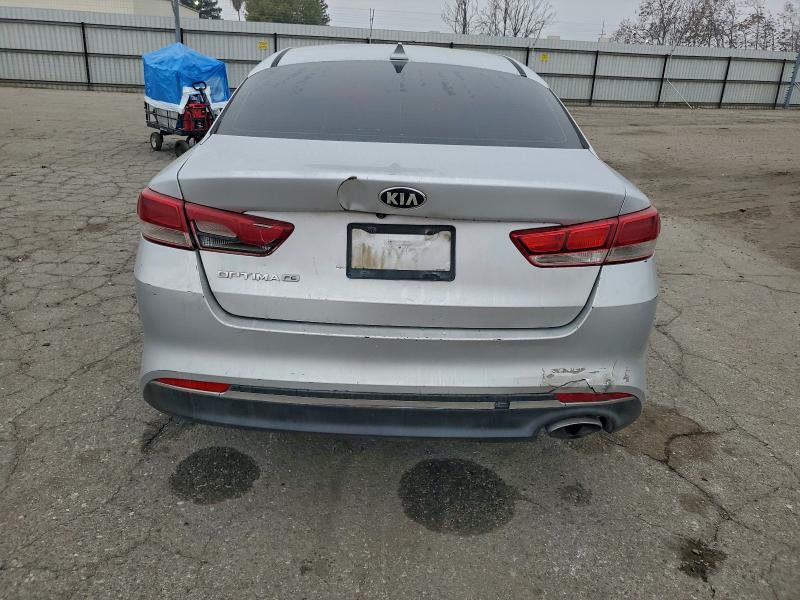 Photo 6 from auction – 2016 KIA OPTIMA LX with VIN 5XXGT4L32GG031228