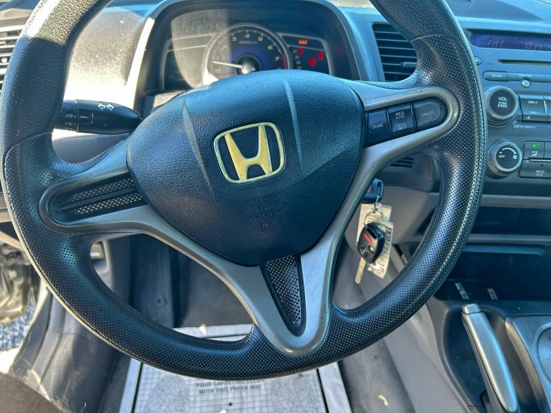 Photo 12 from auction – 2011 HONDA CIVIC LX with VIN 19XFA1F51BE027931