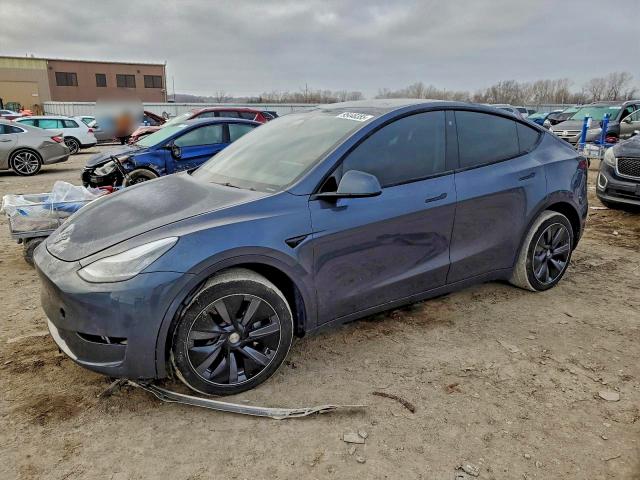 TESLA MODEL Y 2023 with VIN 7SAYGDEE0PA056090 - Photo from auction