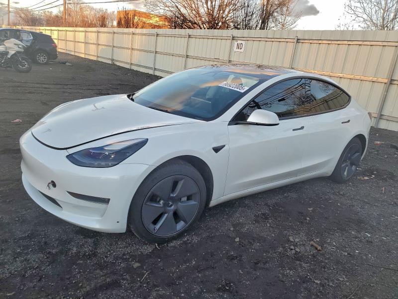 TESLA MODEL 3 2022 with VIN 5YJ3E1EBXNF170096 - Photo from auction
