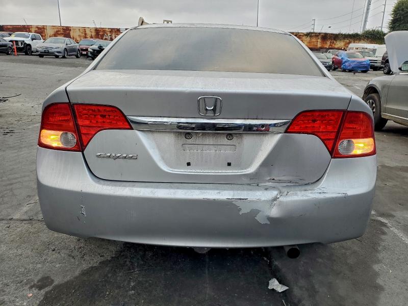 Photo 6 from auction – 2011 HONDA CIVIC LX with VIN 19XFA1F54BE027762