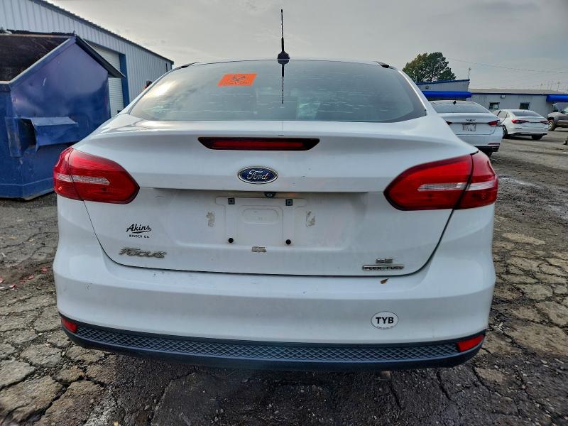 Photo 6 from auction – 2015 FORD FOCUS SE with VIN 1FADP3F24FL321642