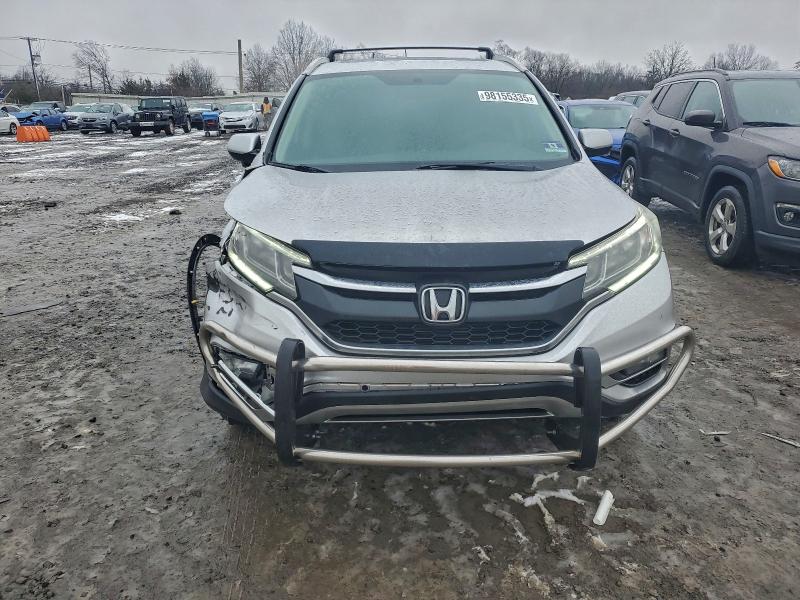 Photo 5 from auction – 2015 HONDA CR-V EX with VIN 2HKRM4H51FH657825