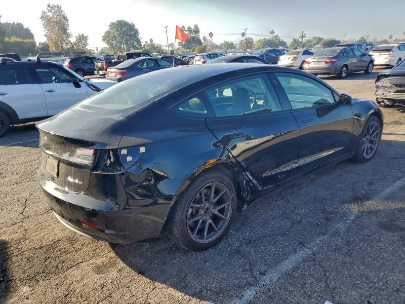Photo 3 from auction – 2023 TESLA MODEL 3 with VIN 5YJ3E1EB5PF628632
