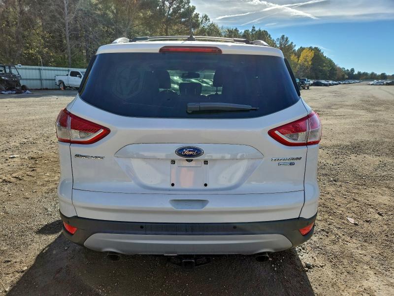 Foto 6 de la subasta – 2013 FORD ESCAPE TIT con VIN 1FMCU9J95DUD54853