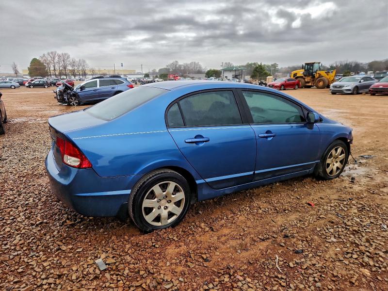 Photo 3 from auction – 2011 HONDA CIVIC LX with VIN 19XFA1F56BE012731