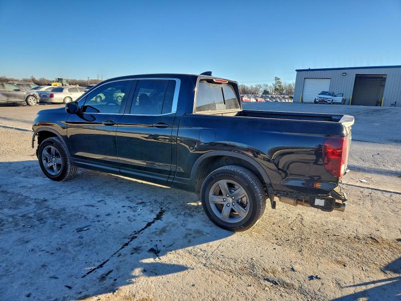 Photo 2 from auction – 2021 HONDA RIDGELINE with VIN 5FPYK3F54MB014077