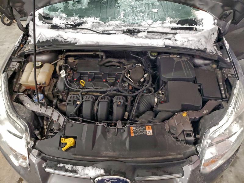 Photo 11 from auction – 2014 FORD FOCUS SE with VIN 1FADP3F26EL335069