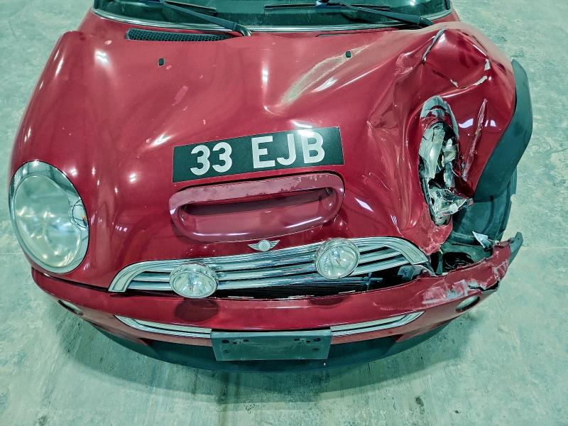 Photo 11 from auction – 2004 MINI COOPER S with VIN WMWRE33404TD88909