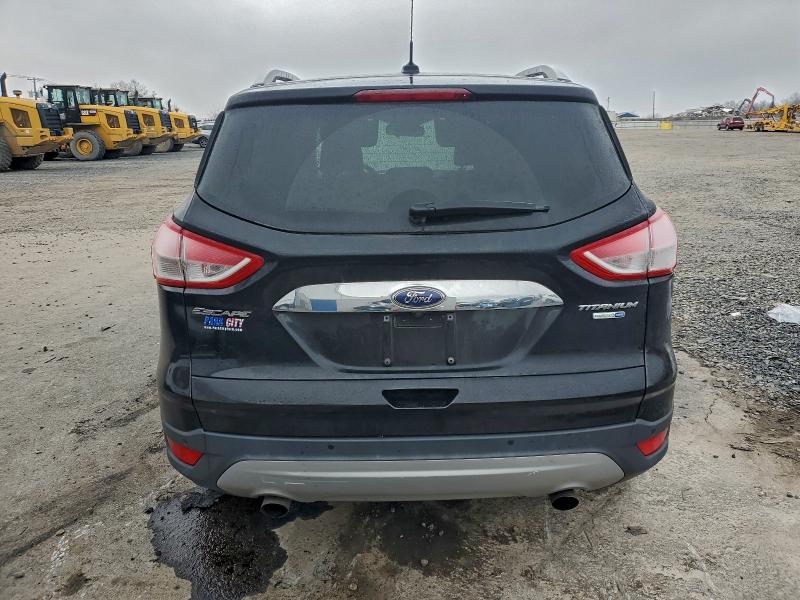 Photo 6 from auction – 2016 FORD ESCAPE TIT with VIN 1FMCU9J98GUB42226