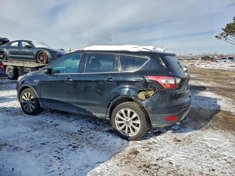 Photo 2 from auction – 2017 FORD ESCAPE TIT with VIN 1FMCU9J92HUC99171
