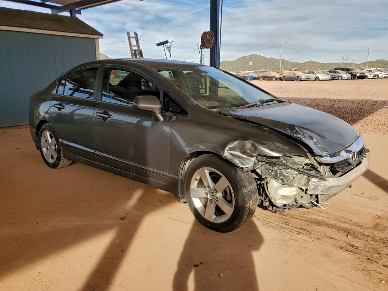 Photo 4 from auction – 2010 HONDA CIVIC LX-S with VIN 19XFA1F60AE050012