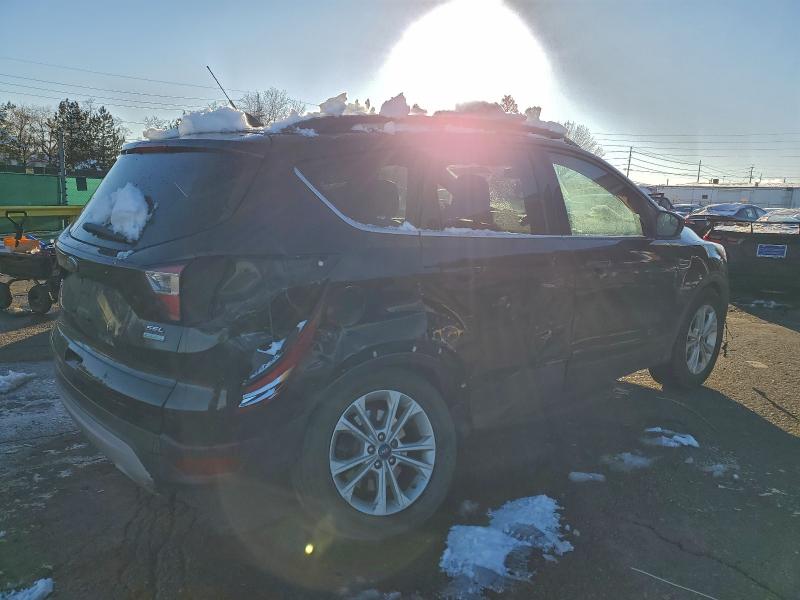 Photo 3 from auction – 2018 FORD ESCAPE SEL with VIN 1FMCU0HD9JUB72526