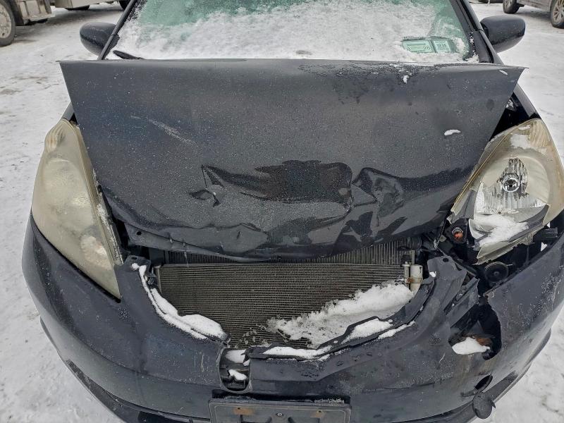 Photo 11 from auction – 2012 HONDA FIT with VIN JHMGE8H36CC030375