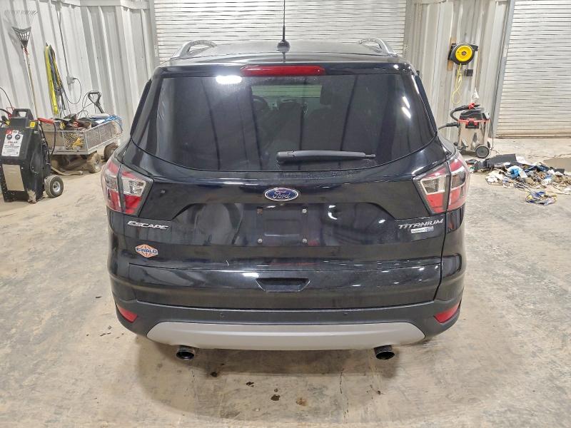 Photo 6 from auction – 2017 FORD ESCAPE TIT with VIN 1FMCU9JD7HUB29618