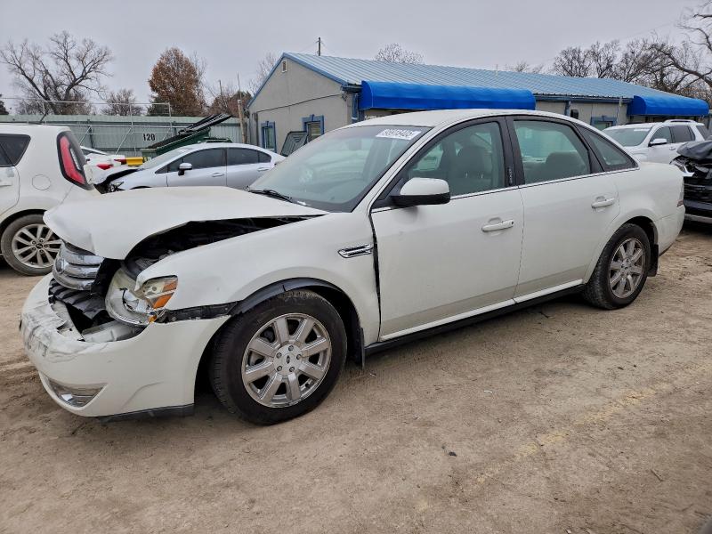 FORD TAURUS SE 2009 with VIN 1FAHP23WX9G118156 - Photo from auction