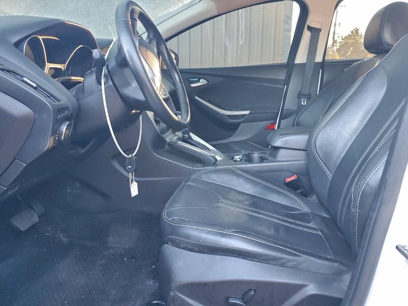 Photo 7 from auction – 2014 FORD FOCUS SE with VIN 1FADP3F24EL104459