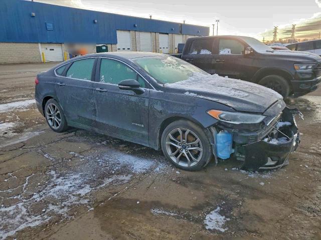 Photo 4 from auction – 2019 FORD FUSION TIT with VIN 3FA6P0RUXKR165994