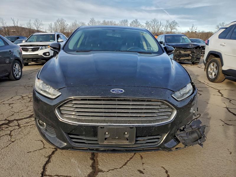 Photo 5 from auction – 2016 FORD FUSION with VIN 3FA6P0HD5GR154510