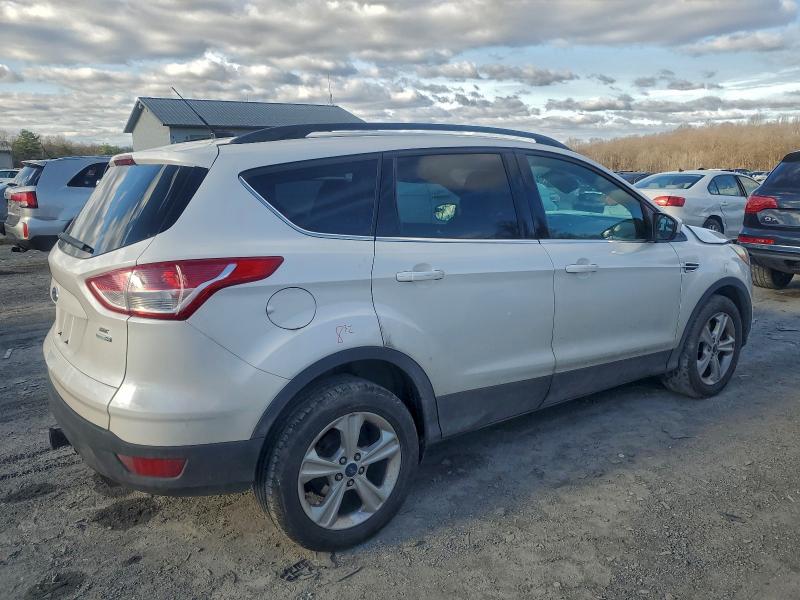 Photo 3 from auction – 2014 FORD ESCAPE SE with VIN 1FMCU9G97EUB19895