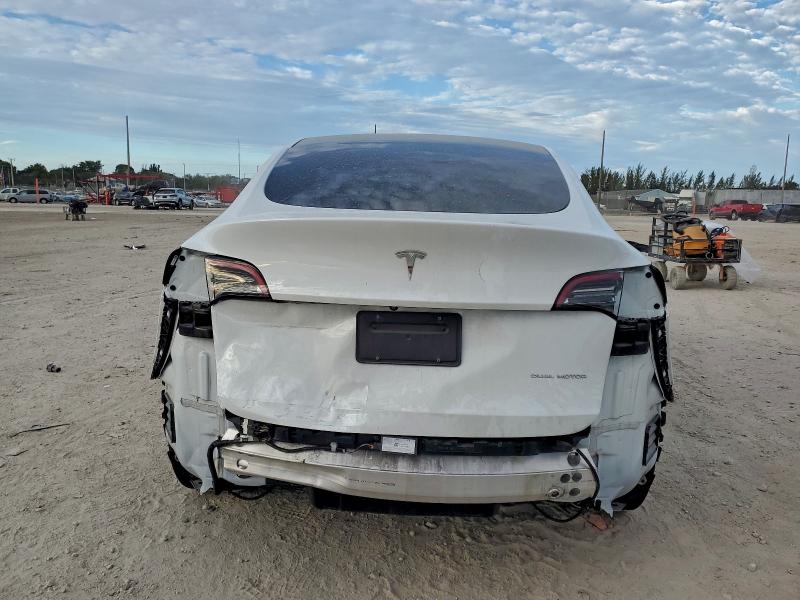 Photo 6 from auction – 2023 TESLA MODEL Y with VIN 7SAYGAEE3PF646270